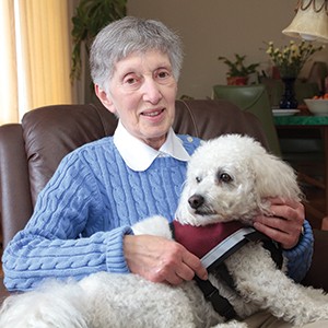 senior with Canine Companion volunteer