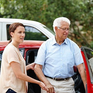 senior client arrives at his destination thanks to his volunteer Rides driver