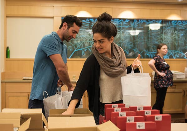 volunteers packing food bags