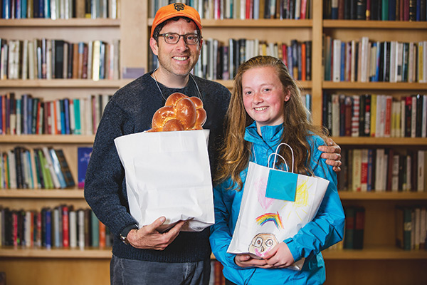 Father and daughter delivering food