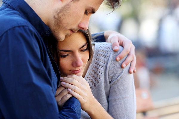 grieving couple