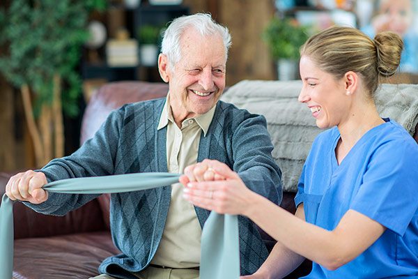 Physical Therapist with senior client