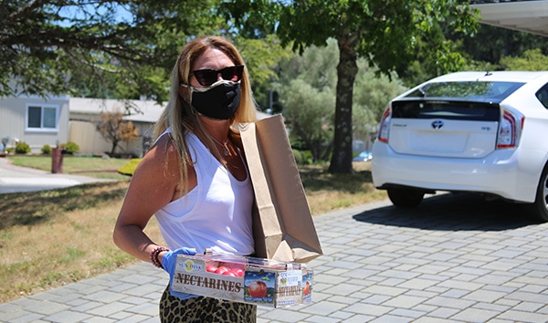 Jessica Hare delivers groceries to seniors in need