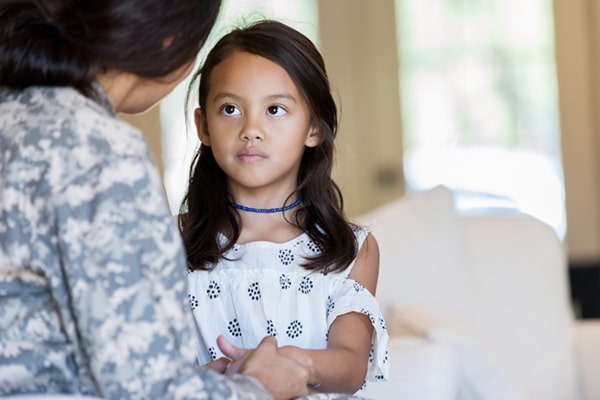 mom talking to daughter