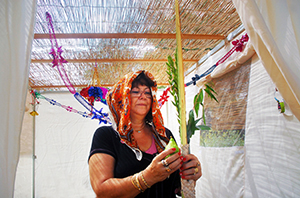 woman in sukkah