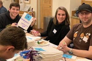 people decorating Hanukkah bags