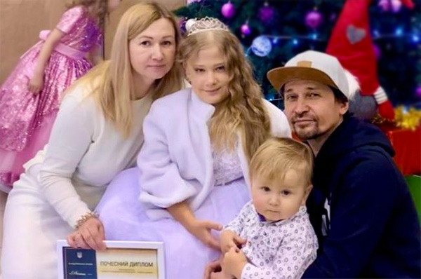 Olesia, Yaroslava, baby Lukas, and Volodymyr during happier times in Ukraine.