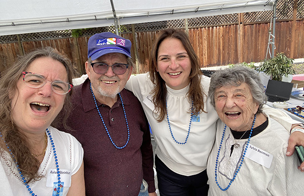 Avivit enjoys a Café by the Bay event with members Abe and Sylvia Berman and Naama Lugasi, Director of JFCS ’Israeli Department.