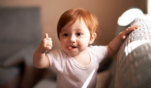 Toddler Giving Thumbs Up