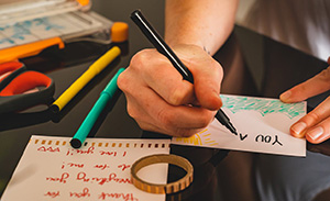 Hand writing a letter