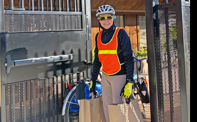 An avid cyclist, JFCS volunteer Margie Baer delivers greatly needed food to homebound seniors in Marin by bike.