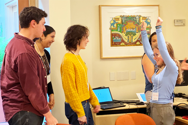 YouthFirst summer interns enjoying ice-breaker exercises during kick-off meeting at JFCS.