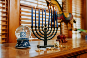 Hanukkah candles and dreidel