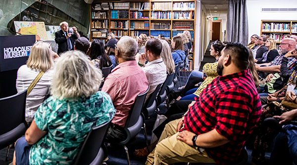 An audience of Teachers at Holocaust Education seminar listening to a Holocaust survivor