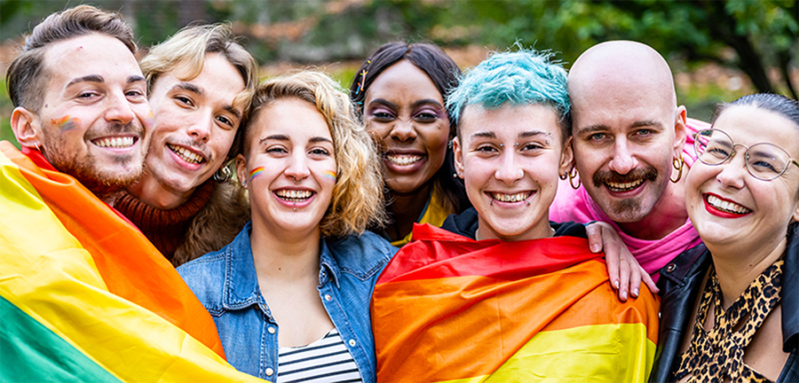 group of people with rainbow flag