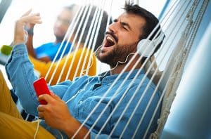 person singing while listening to musicc