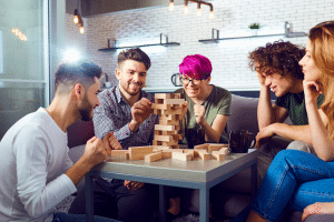 people playing jenga