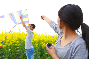 people flying a kite