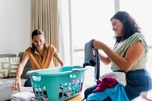 people folding laundry