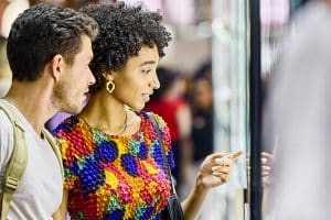 pople looking at display