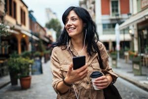 person walking with iphone