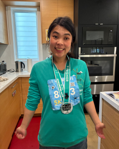 Alex Li smiling and sporting a medal from the 2026 San Francisco Half Marathon