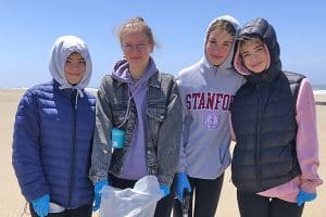 volunteers at beach clean up