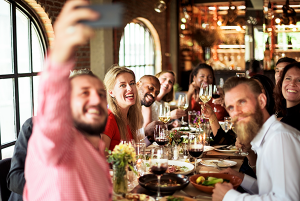 people enjoying dinner out