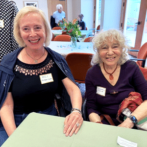 Two volunteers enjoying themselves at the event.